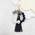 Silicone beaded keychain with leopard print, wood bead and black leather tassel - Black Paw Print