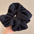 Oversized black satin scrunchie with smooth silk texture for elegant hairstyles - Oversized / Black (Satin)