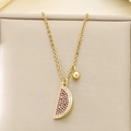 Detailed view of gold necklace with watermelon slice pendant set with red and black stones - Full Zirconia Watermelon Slice Style (KN292057-Z)