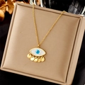 Detail of gold necklace with eye-shaped pendant, blue eye center and five small golden discs - Evil Eye Pendant Style (N1961)
