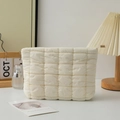 Chic quilted beige clutch bag with a soft down-like texture and stylish square patterns - White