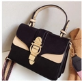 Vintage retro crossbody bag in black and beige suede with patterned woven strap - Black