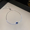 Bracelet Evil Eye en argent avec pierre bleu foncé et zircone cubique brillante - Style Ajouré Mauvais Œil Argenté (12# Bracelet - Argent - Bleu - Ajouré)