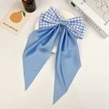 Light blue gingham bow hair clip with long ribbons on a decorative white tray - Small Sky Blue Gingham