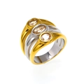 Detail of three-layer stacked titanium rings with oval champagne zircon in bezel setting - Two-tone Gold Silver Champagne Zircon
