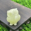 Green natural stone owl figurine carved in jade-like material on wooden base - Afghan Jade