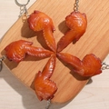 Funny realistic roasted chicken wing keychains in a 5-piece set on a wooden base - Chicken Wing - Keychain Style