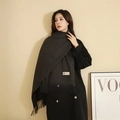 Thick dark gray cashmere scarf with fringe details worn by a model in a cozy setting - Thickened Tassel Style (330g) / 200*70cm / Carbon Gray