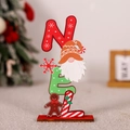 Detailansicht der NOEL Weihnachtsdeko aus Holz mit Lebkuchenmann und Wichtel Motiven - Schneeflocke Gnom NOEL Deko