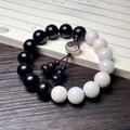 Yin Yang Tai Chi bracelet with black wood beads, white jade-like beads and gourd charms - White Jade Bodhi Tai Chi Style
