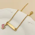 Bracelet chaîne plaqué or 18K avec breloque dinosaure rose et plaque métallique - Licorne