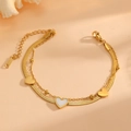Detailed view of a layered gold-plated heart bracelet with shell inlays and snake chain - Gold Double Layer Heart Style (E417)