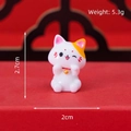 Miniature lucky cat resin ornament with bell and wink face, 2.7cm tall for desk decor - Waving Lucky Cat