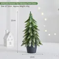 Miniature 22cm frosted Christmas tree with white snow tips and black circular base - Inverted Pointy Tree 22cm
