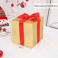 Matte gold 20cm Christmas gift box with red ribbon bow for festive window display decor - 20cm Matte Gold Gift Box