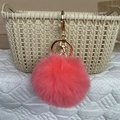 Pink faux rabbit fur pom pom keychain with a gold-tone lobster clasp for handbags - Watermelon red