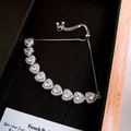 Macro detail of silver heart-shaped zircon bracelet displayed in a luxury gift box - Style 52-Silver