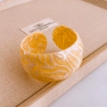 Macro shot of wide open bangle with vintage branch texture and yellow marble pattern - Yellow White Tiger Stripe Resin Bangle (41#)