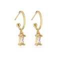 Detailed view of gold plated C-shaped earrings with rectangular white zircon pendants - White