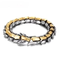 Detailed close-up of gold and silver dragon scale textured bracelet with metal clasp - Gold & Silver
