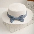Women's white flat top straw sun hat with blue striped bow on a white wire basket - M (56-58cm) / White