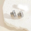 Detail shot of silver triple-layered hoop earrings with baguette-cut zircon stones - ES2388-2 Silver Triple-Layer Wrapped Zircon Earrings