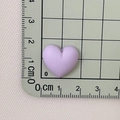 Detailed measurement of lavender resin heart charm showing 2cm size on a grid ruler - Purple
