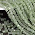 Detailed view of light green bamboo-shaped glass beads for DIY jewelry making - 6x12mm Light Celadon (1Pc)