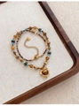 Vintage beaded necklace with tiger eye stone and gold heart pendant on fabric - Gold Brown Heart Beaded Style (23#)