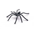 Detailopname van een realistische zwarte plastic speelgoedspin voor Halloween-decor - Zwart