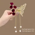 Detail of butterfly hair claw clip with burgundy velvet flowers and pearl tassels - Wine Red Butterfly