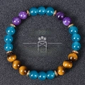 Tiger eye and turquoise wealth bracelet with blue beads and golden metal spacers - Cat Eye Purple Texture Tiger Eye Style (Wealth-7)