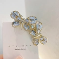 Golden butterfly hair clip with sparkling rhinestones and cubic zirconia on card - Two Butterflies Style