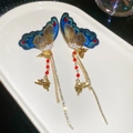 Detailed macro view of embroidered butterfly wings with sparkling zircons and tassels - Butterfly Style(9#) / 925 Silver Needle / Gold-Red