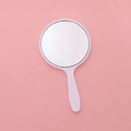 Mini handheld makeup mirror in white plastic frame with handle on pink background - 5.5x10cm / White