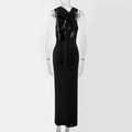 Detail of a sleek black backless maxi dress featuring a crossed knot design and slim fit - S / Black