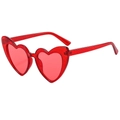 Detail of red heart-shaped sunglasses featuring glitter resin frames and tinted lenses - Glitter Red