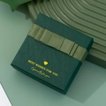 Dark green jewelry gift box with textured paper finish and elegant ribbon bow - Dark Green Bow Tie