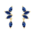 Detail of leaf-shaped gold earrings with four marquise-cut navy blue zircon stones - Blue Zircon