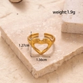 Golden heart-shaped hands ring in titanium steel, 1.27cm height, open adjustable band - Gold Hand Gesture Heart Ring (MN429-Gold)