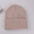 Pink rib-knit beanie hat for winter warmth with a minimalist cuff design for men and women - Adult 56-60cm / Beige