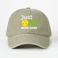 Detail of washed cotton baseball cap featuring Just One More Game pickleball print - Light Khaki