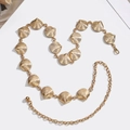 Elegant gold shell chain belt accessory for fashion dresses on a clean white background - Gold