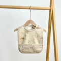 Waterproof baby bib detail with hedgehog and mushroom prints and a crumb catcher pocket - Floral Pink Mouse