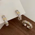 Elegant silver paved zircon hoop earrings and matching ring set with gold line detail - Pave Inlaid Two-tone Earrings (A-140)