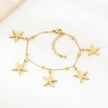 Gold stainless steel starfish charm bracelet with small beads and lobster clasp closure - Starfish Style (KB204442-SXSJ)