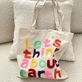 Beige canvas tote bag with multi-color letter embroidery on soft plush cushions - Beige