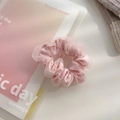 Pink floral mesh scrunchie hair tie with soft fabric texture on a white surface - Small / Pink