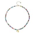 Bohemian colorful natural stone beaded necklace with a small golden bubble letter m pendant - Letter M