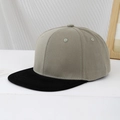 Close-up of kids two-tone snapback cap showing grey crown and black flat brim details - 54cm (3-8 Years) / Grey Green